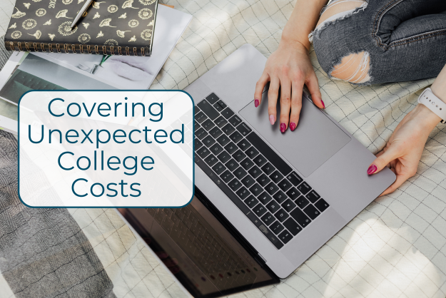 A box with the words "Covering Unexpected Costs" is shown overlaying a photo. In the photo, we see an open laptop with hands on the keyboard with pink painted nails, and a knee with ripped black jeans.